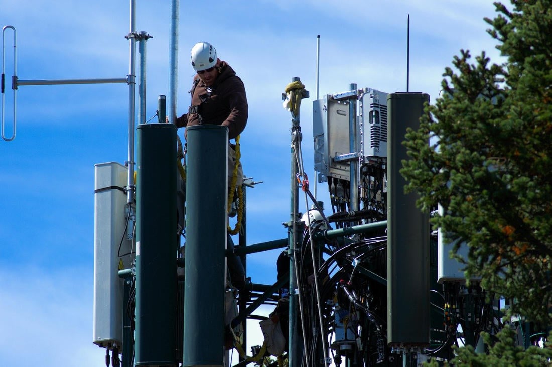 Technician Working On Cell Tower